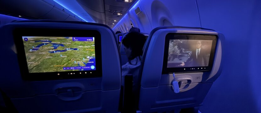 Seatback IFE and blue mood lighting on a JetBlue A220