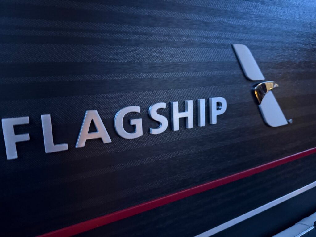 Flagship logo on the bulkhead of the aircraft.