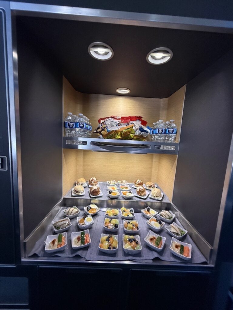 Walk up snack bar in the 777-300ER.