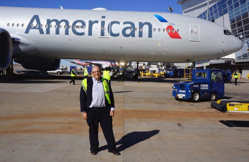 Author Chris Sloan in front of the AA Boeing 777-300ER in 2013