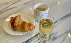 BA lounge croissant, champers and coffee