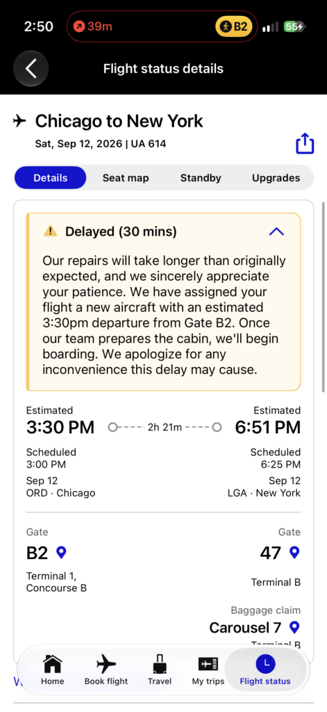 Delayed flight warning is seen on the passenger's mobile device.