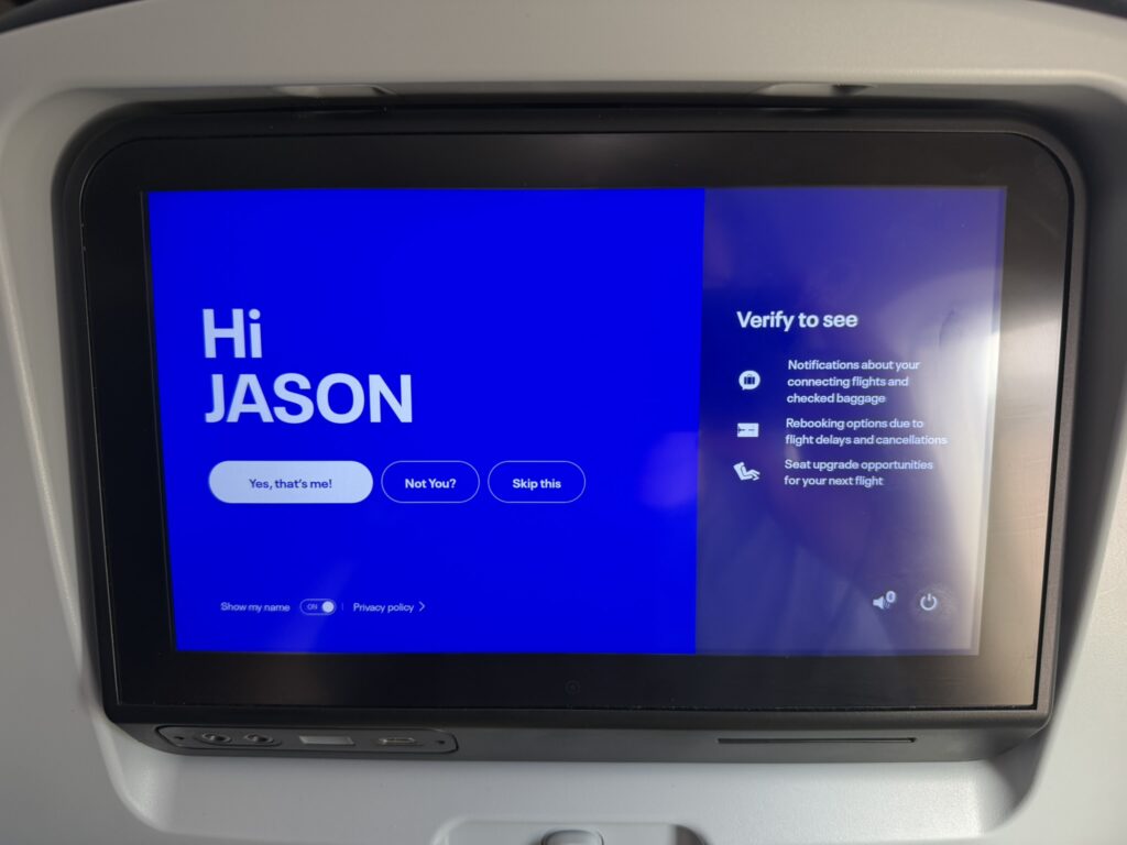 A welcome screen is displayed for the passenger on the seatback IFE. It says: "Hi Jason"