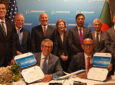 Execs from Boeing and Biman Bangladesh Airlines celebrate the airline's new order