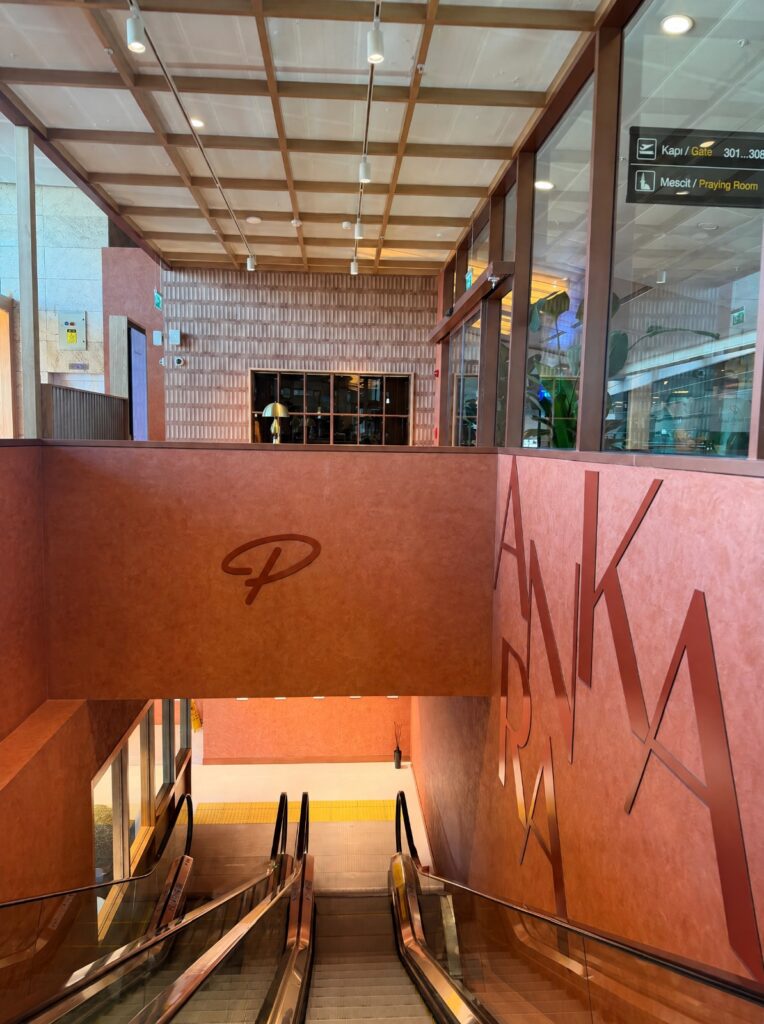 Primeclass lounge escalator.