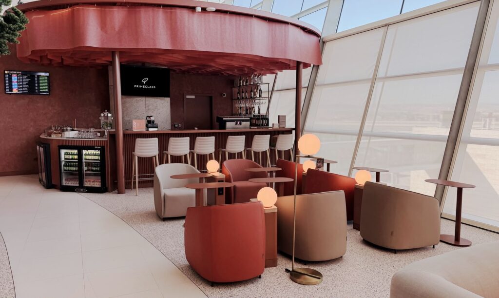 Primeclass lounge seating area and bar.