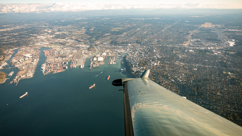 Looking out the window of the SeaPort Pilatus PC-12 over the city.