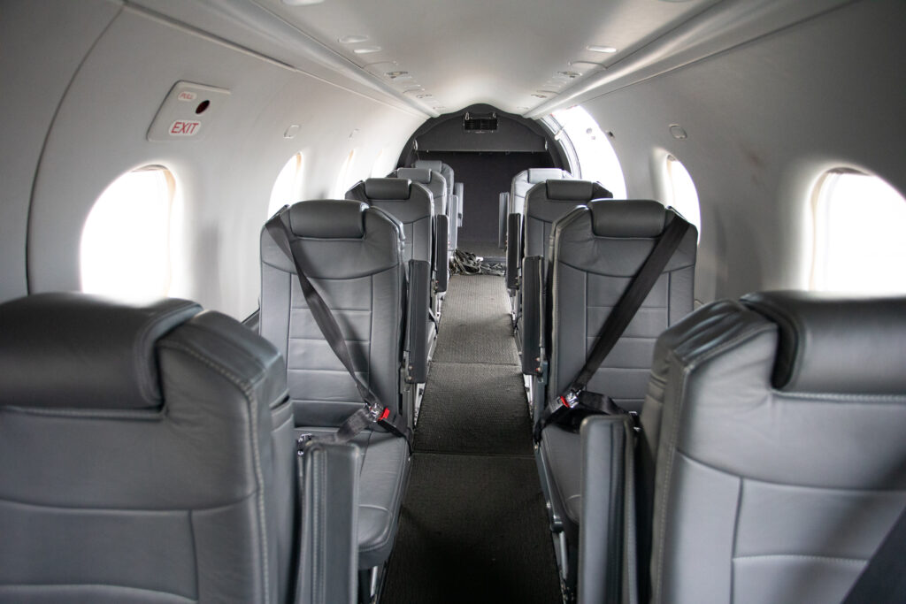 A cabin view of the 1-1 seating layout on the SeaPort Pilatus PC-12.