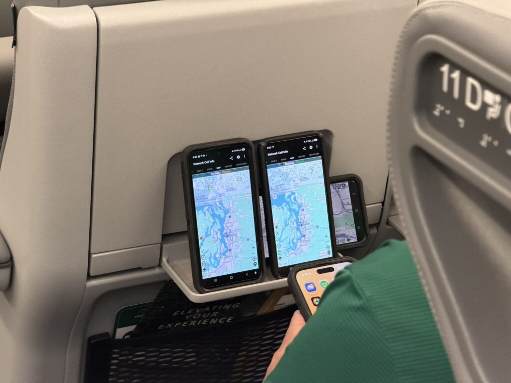 Devices sit on the device holder in the seat aboard this Airo trainset