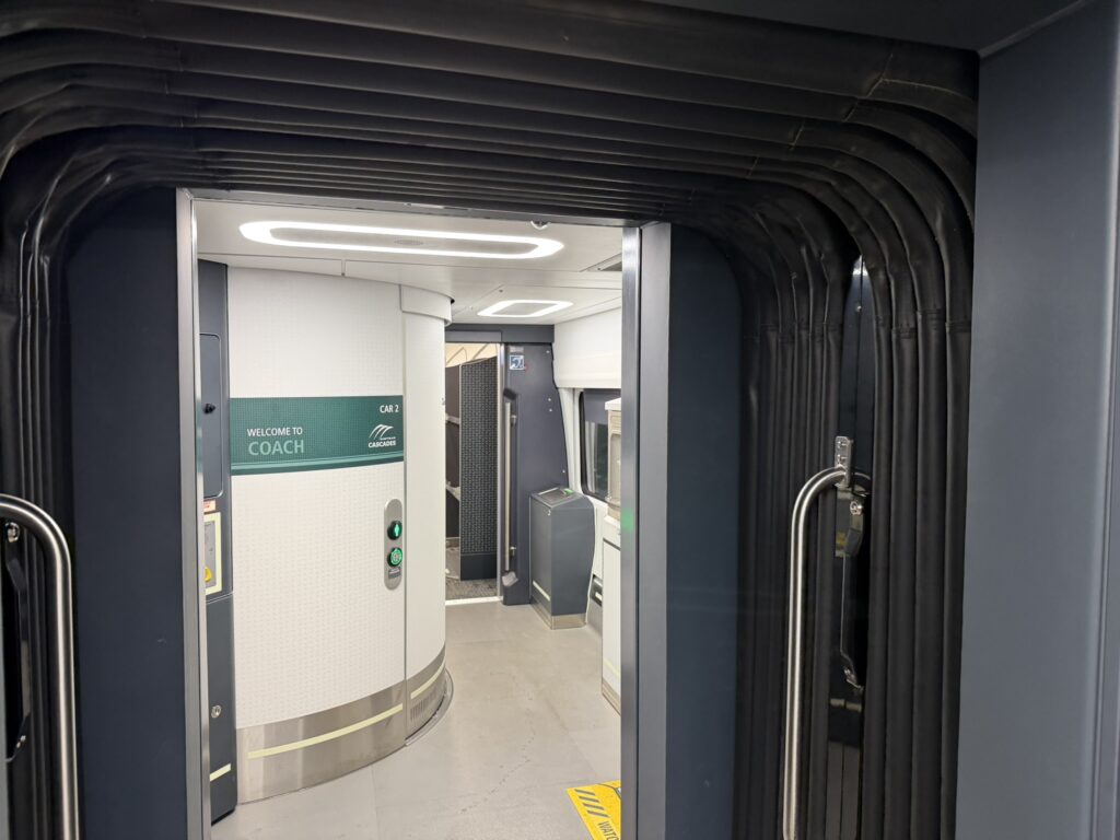 The connected corridor between train cars on the Airo trainset