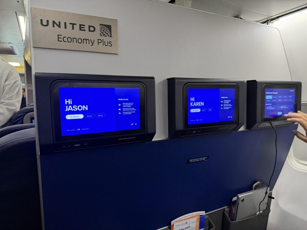 Hello Jason is seen on the IFE screen in front of the passenger