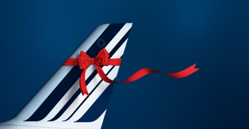 Air France aircraft tail with a red ribbon.
