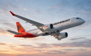 TAAG Angola Airbus A220-300 in flight.